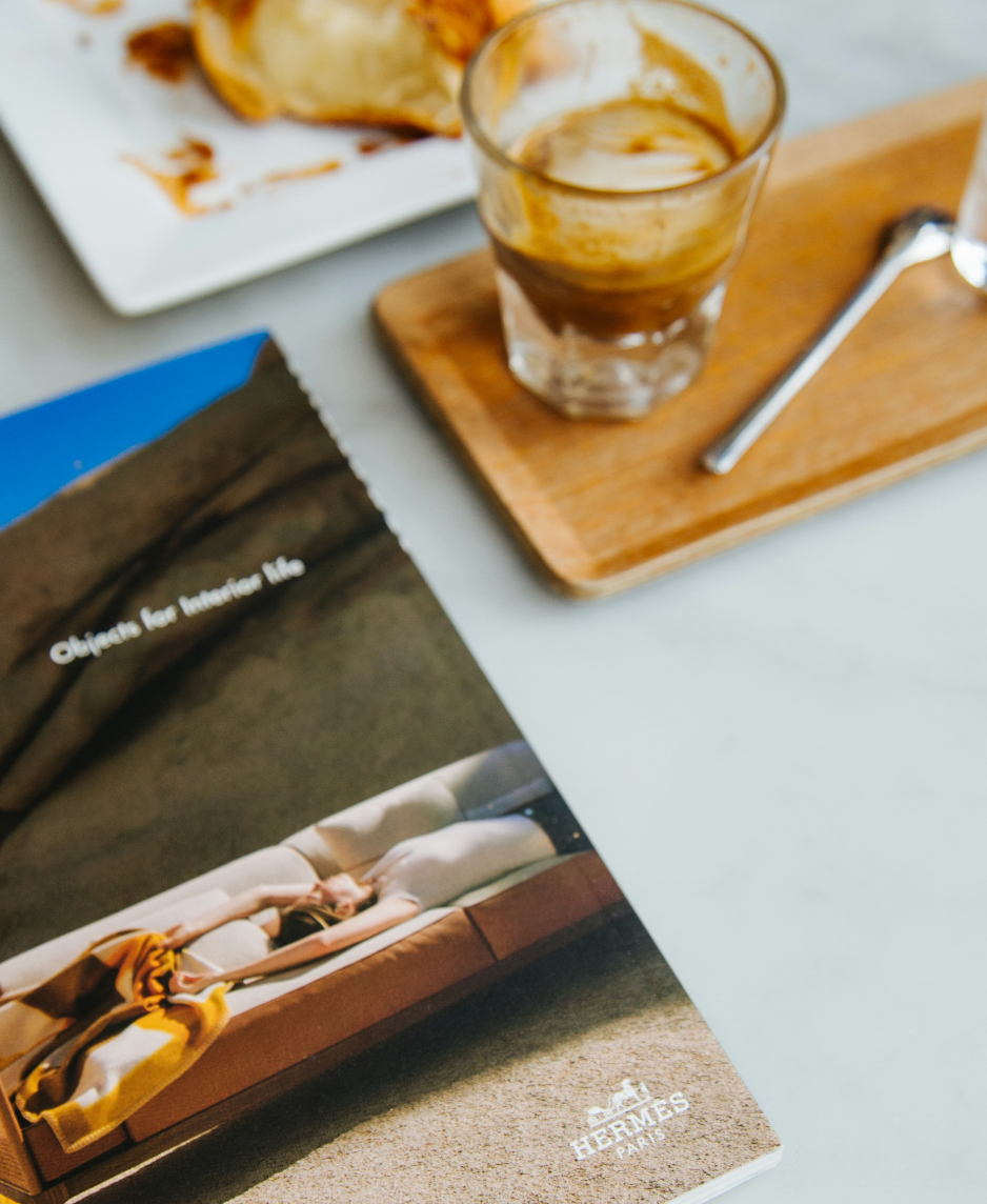 Magazines next to coffee