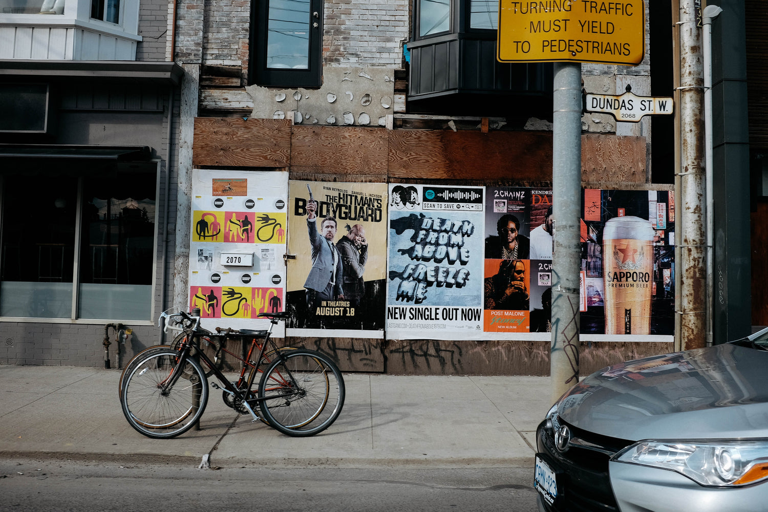 Large format movie sized posters installed on the street in Toronto by Skyline City Media